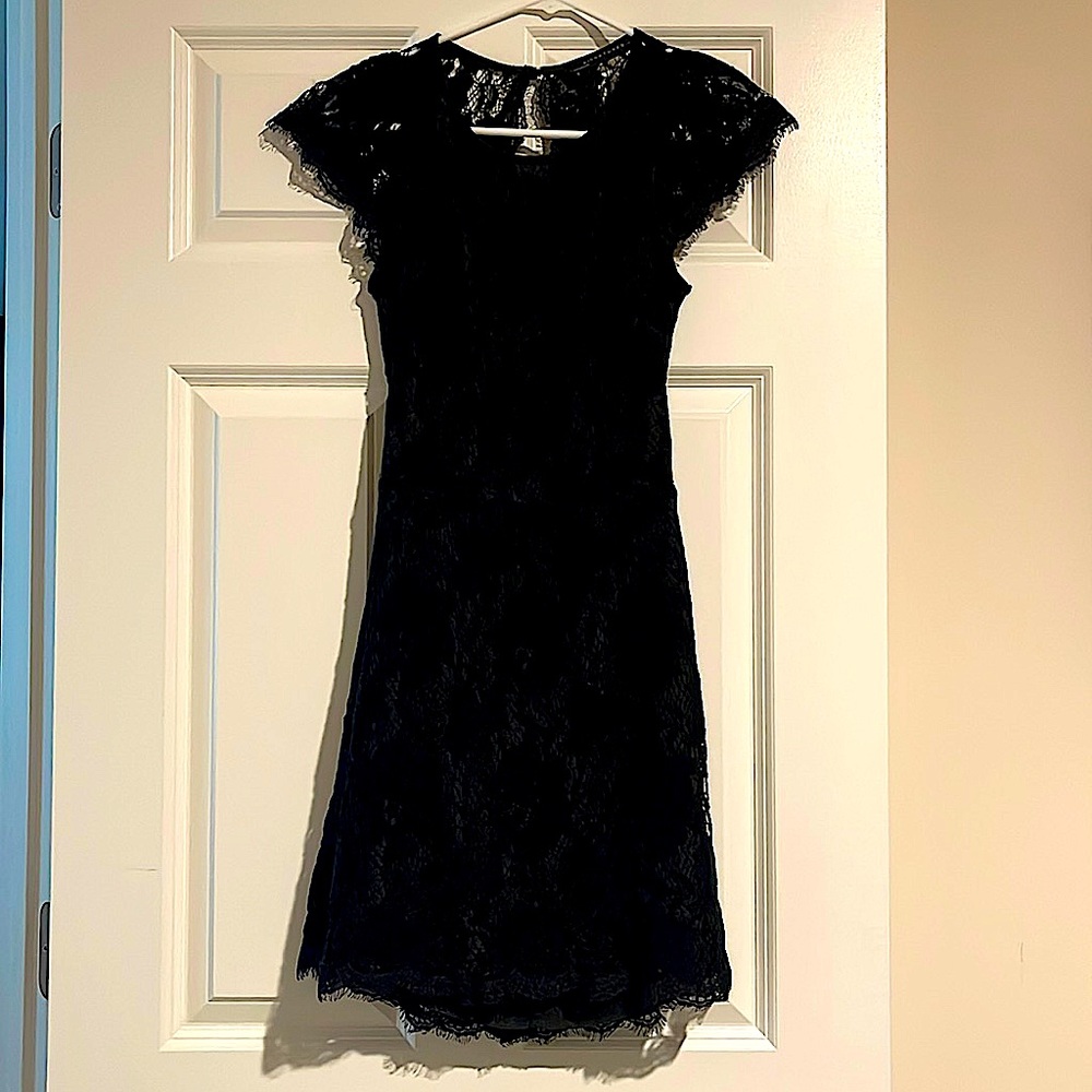Woman’s open back size medium black lace dress